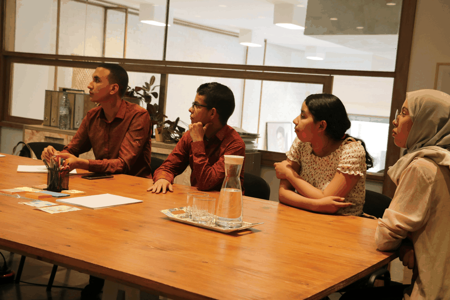 Team planning next steps for Team-based courses in scenario thinking and executive coaching for strategic business resilience